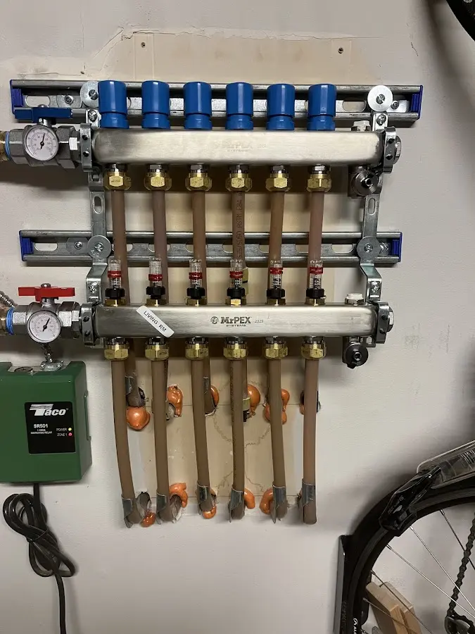 Plumber performing Water Heater Repair at a residential property in Kemah